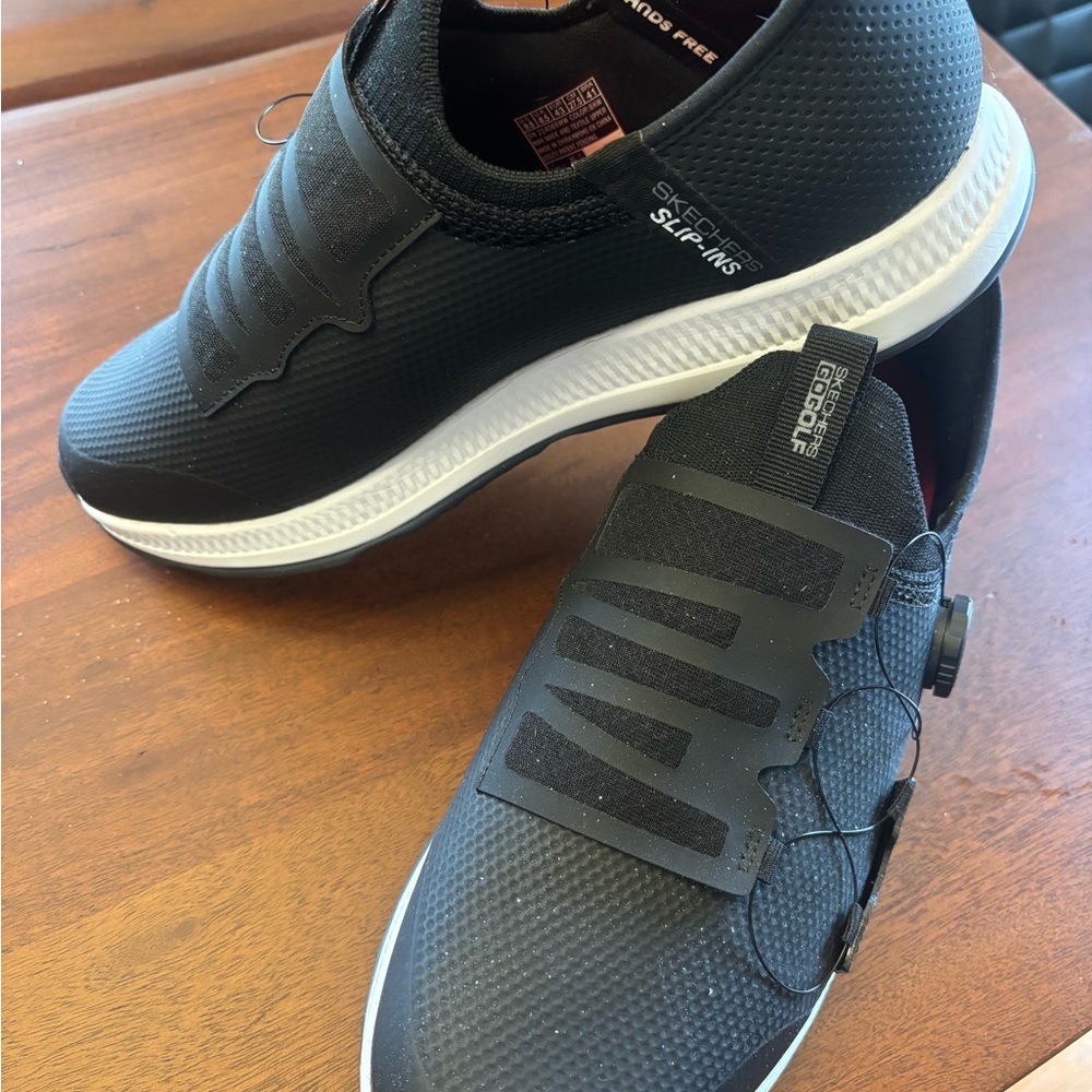 Skechers Black and White Athletic Shoes with Streamlined Design